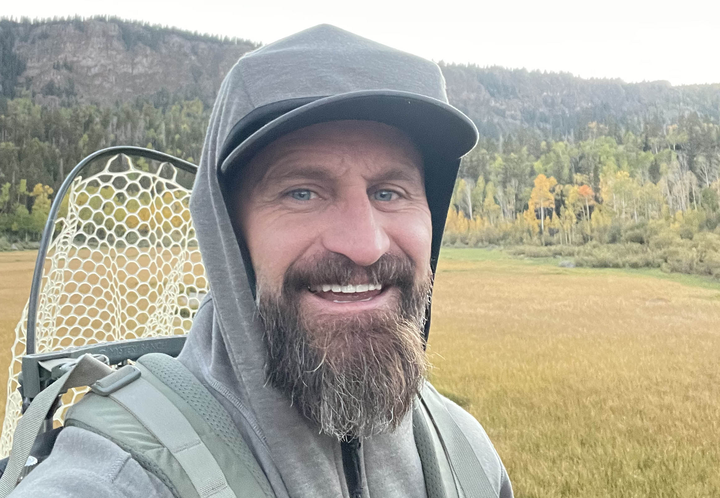 Matt Smith on the trail ready for a day on the water — join us as a volunteer